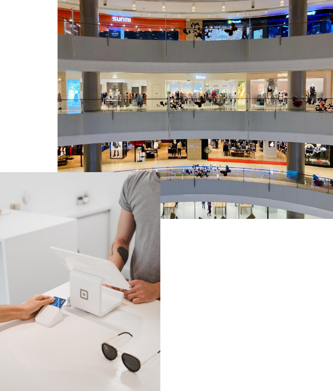 Multiple levels of shops within a shopping centre and a card reader being used