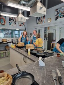 The STax team hard at work cooking